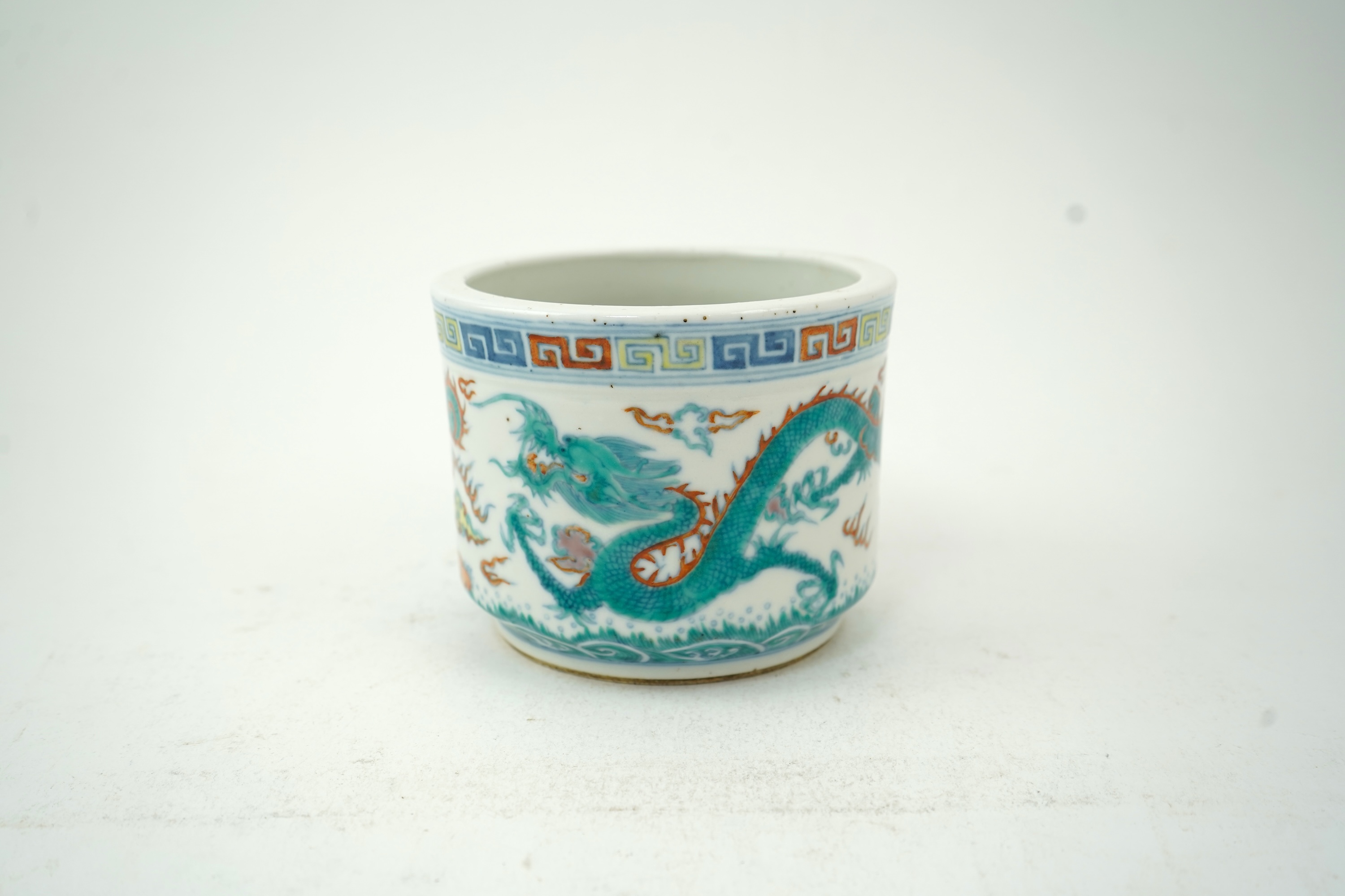 A Chinese doucai ‘dragon’ brushpot, Guangxu six character mark